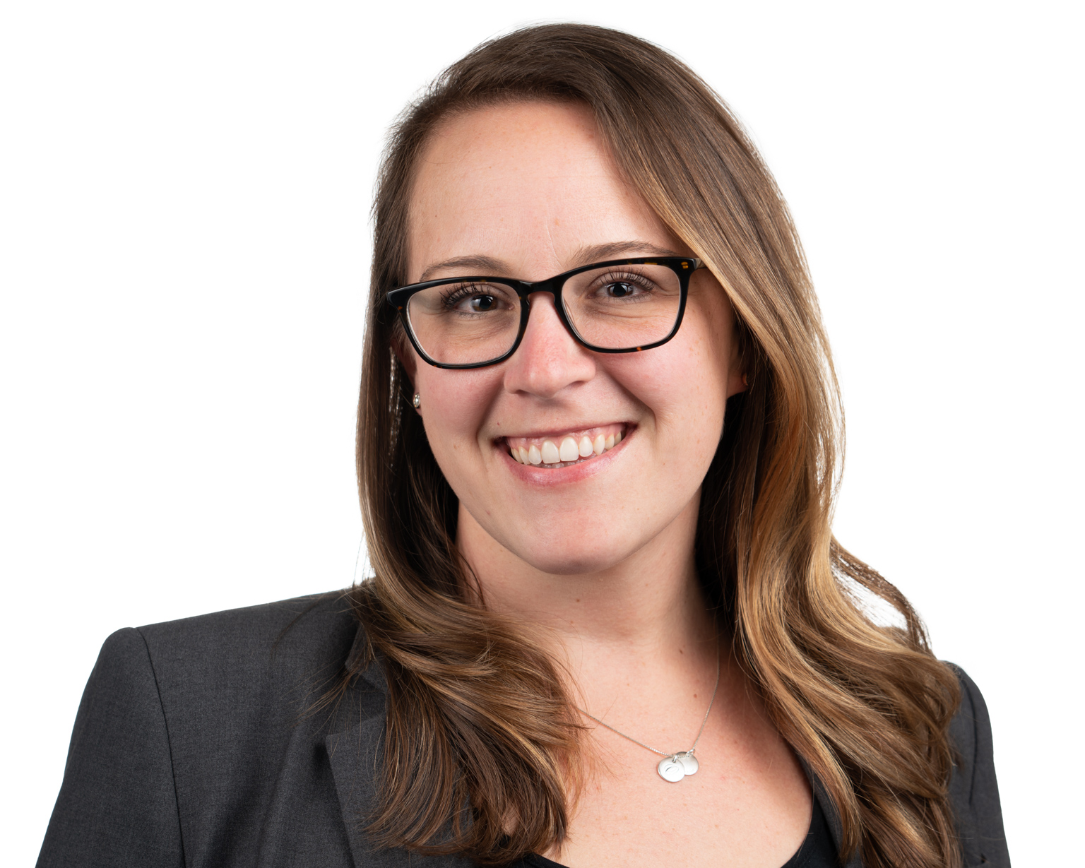 Professional Headshot of a young lady wearing glasses